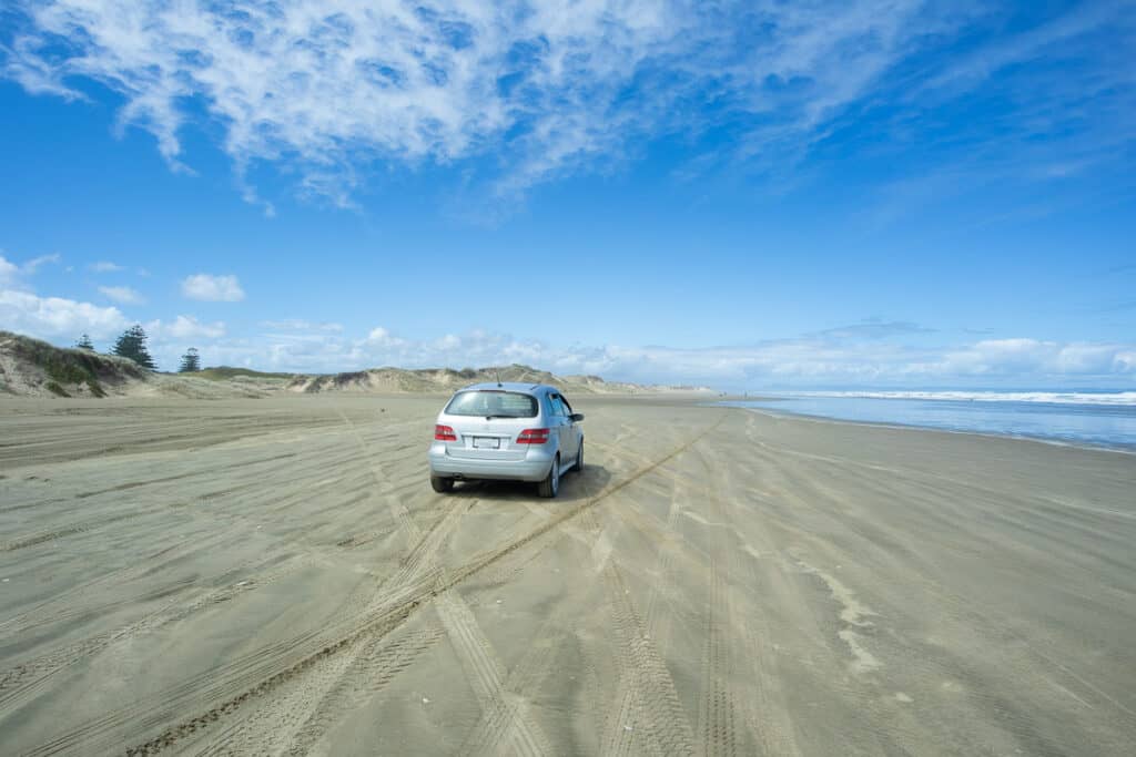 car driving down ninety mile beach